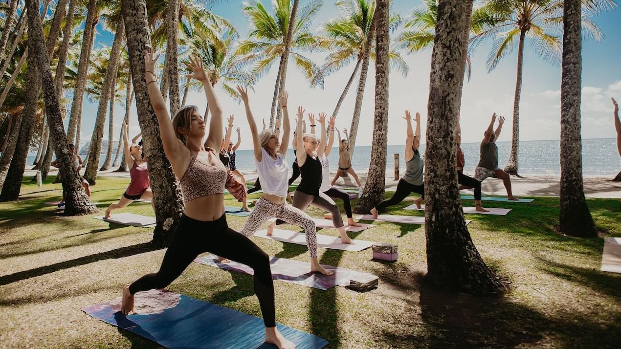 Ladies doing Yoga, Pullman Palm Cove Sea Temple Resort & Spa
