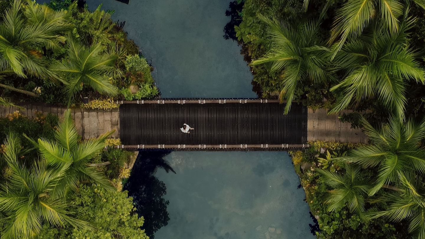 Aerial view of a bridge near The Banjaran Hotsprings Retreat promoting their stay longer special package