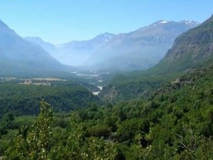 A scenic view of the National Park Rio de los Cipreses in Chile, near the NOI Puma Lodge Hotel.