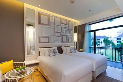Room with two comfy twin beds garden view at U Hotels