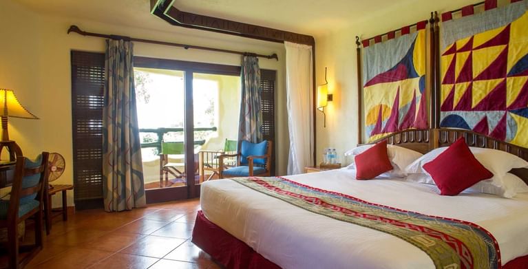 King bed in Standard Room at Lake Manyara Serena Lodge