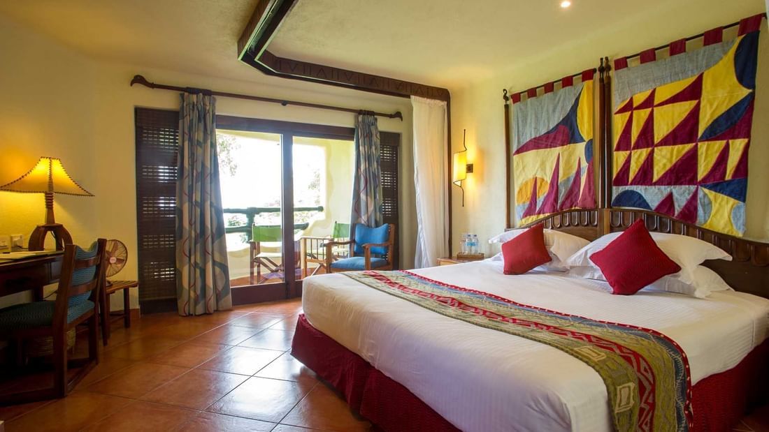King bed in Standard Room at Lake Manyara Serena Lodge