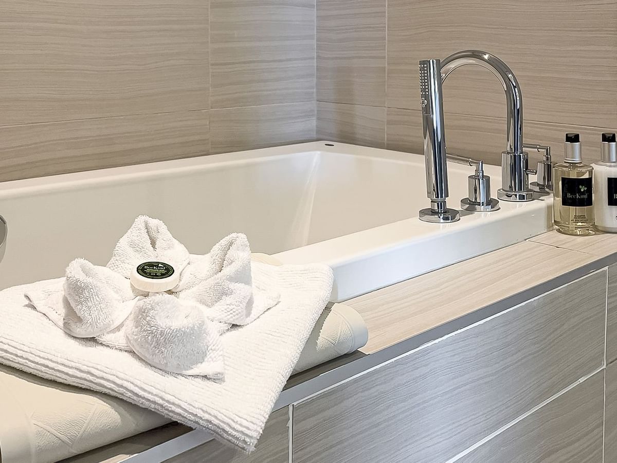 Bath tub with soap and towels