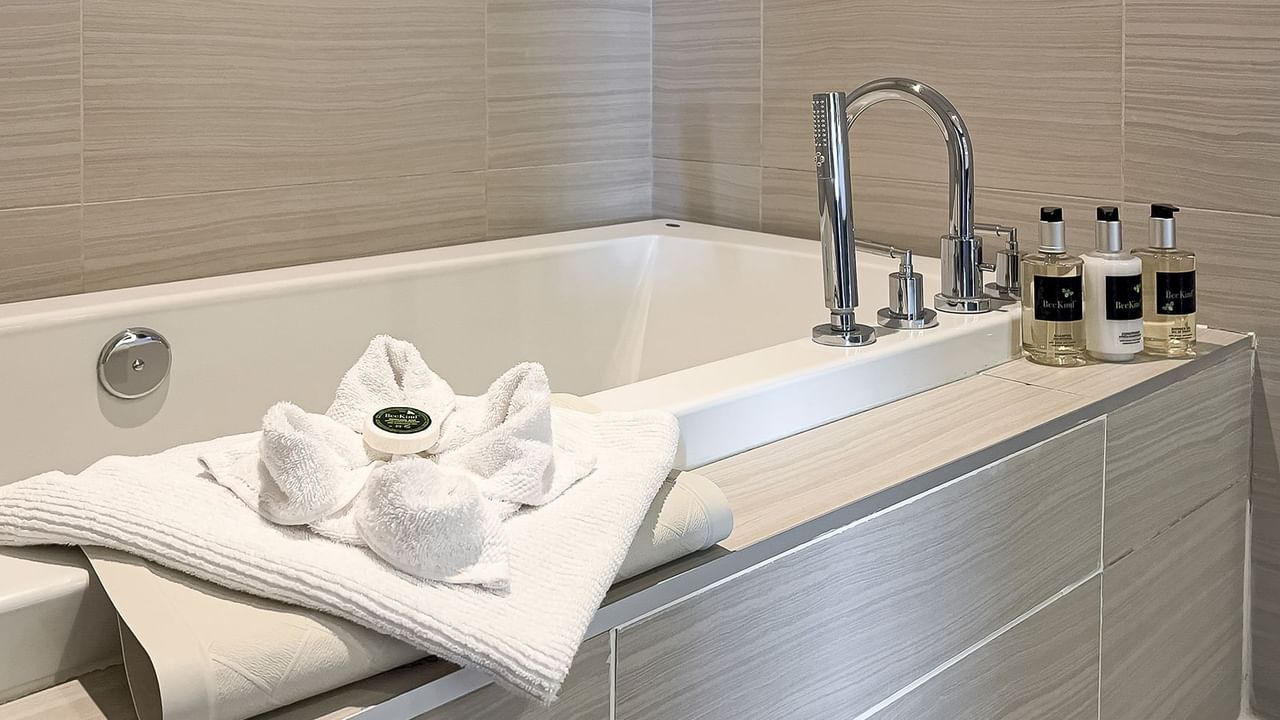 Bath tub with soap and towels