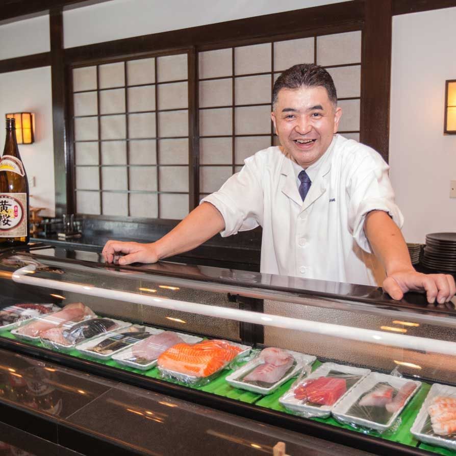 A picture of resident Chef Taketoshi Minam in restaurant area at The Saujana Hotel Kuala Lumpur