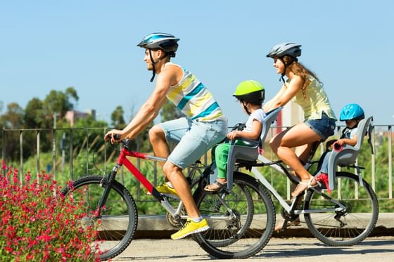 Three people cycling near Hacienda Cantalagua