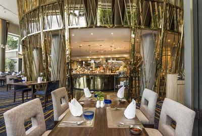 An elegant dining area in River Barge at Chatrium Hotel