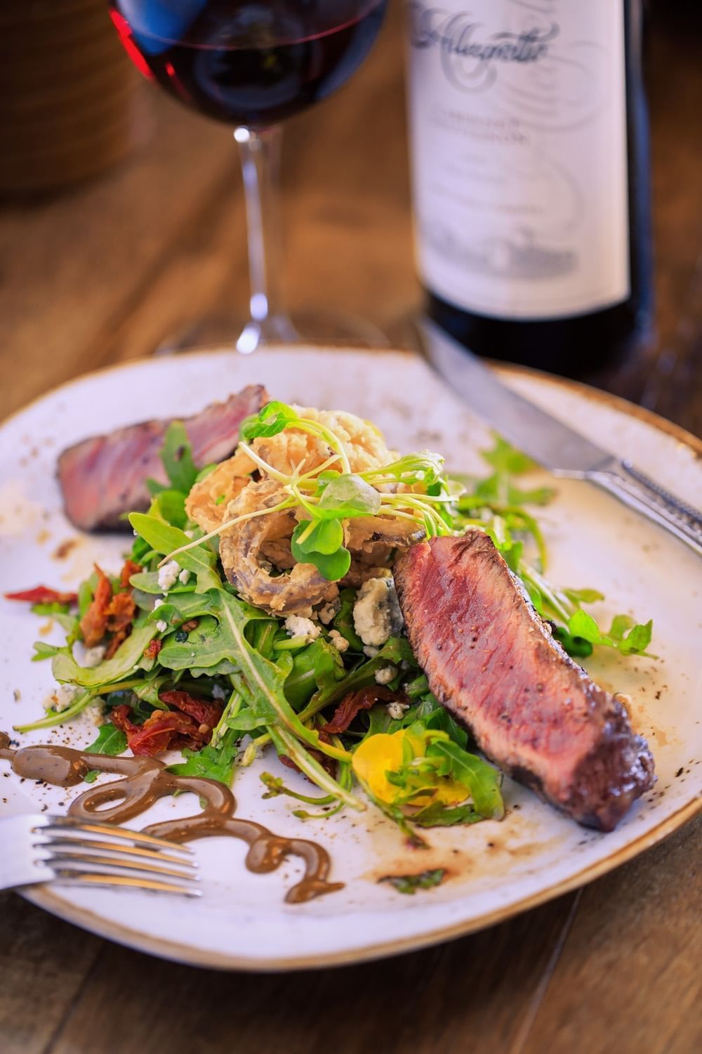 Lorem ipsum Steak salad prepared at our Cello Restaurant