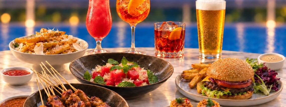 Colorful cocktails and beer alongside appetizers and a burger by a poolside setting for Sip & Chill