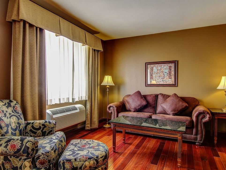 Spacious living area of Deluxe King Suite at The Wildwood Hotel