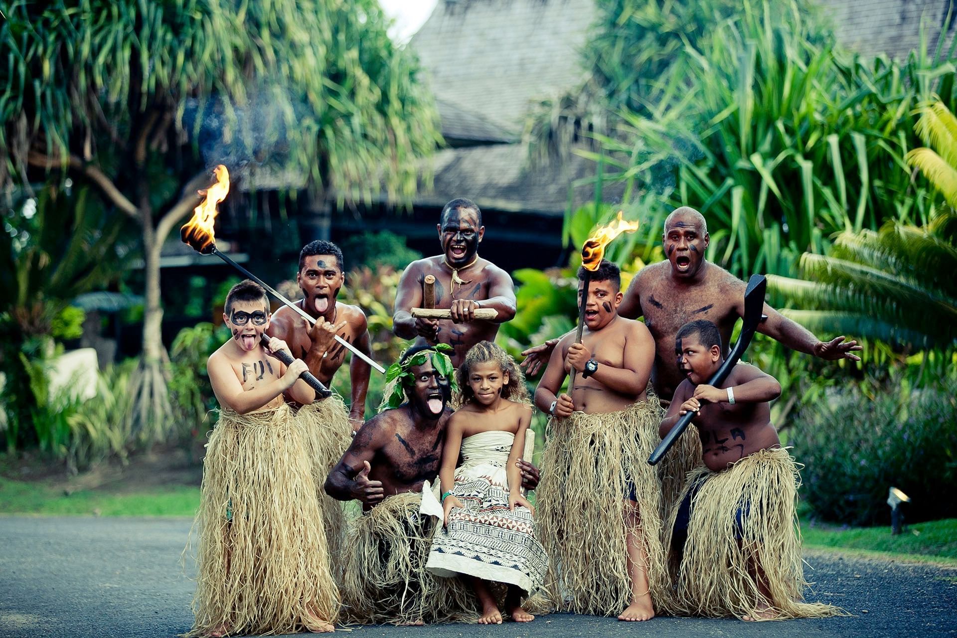 Group picture taken with traditional wear at The Naviti Resort