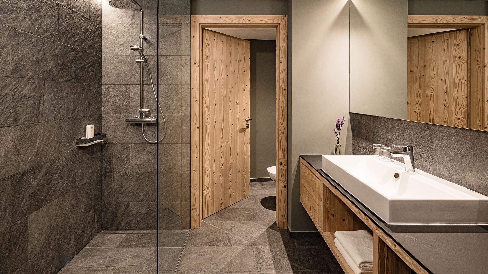 Shower & vanity in Suite Le Vedrette at Falkensteiner Hotels
