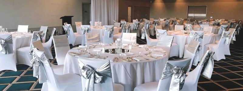Round tables arranged in the Conference Room at Pullman Magenta Shores