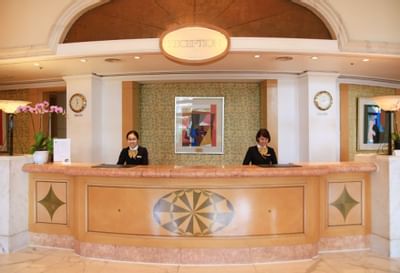 Two receptionist in reception counter at Hanoi Daewoo Hotel