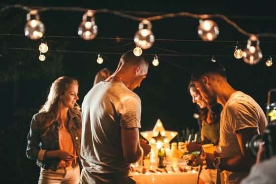 Friends celebrating a event outdoors, The Lodge at Schroon Lake