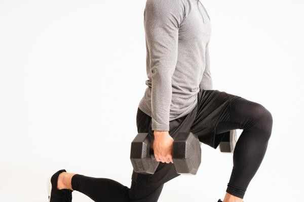 Image of person performing the walking lunge.