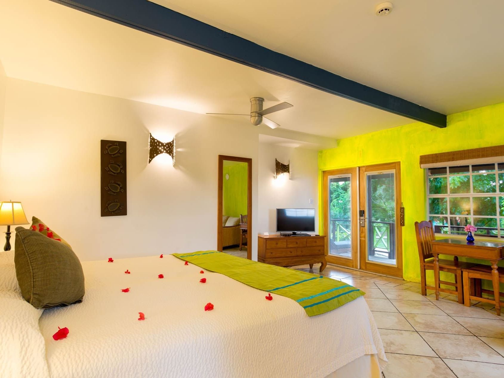 Bedroom arrangement in True Blue Rooms at True Blue Bay Resort