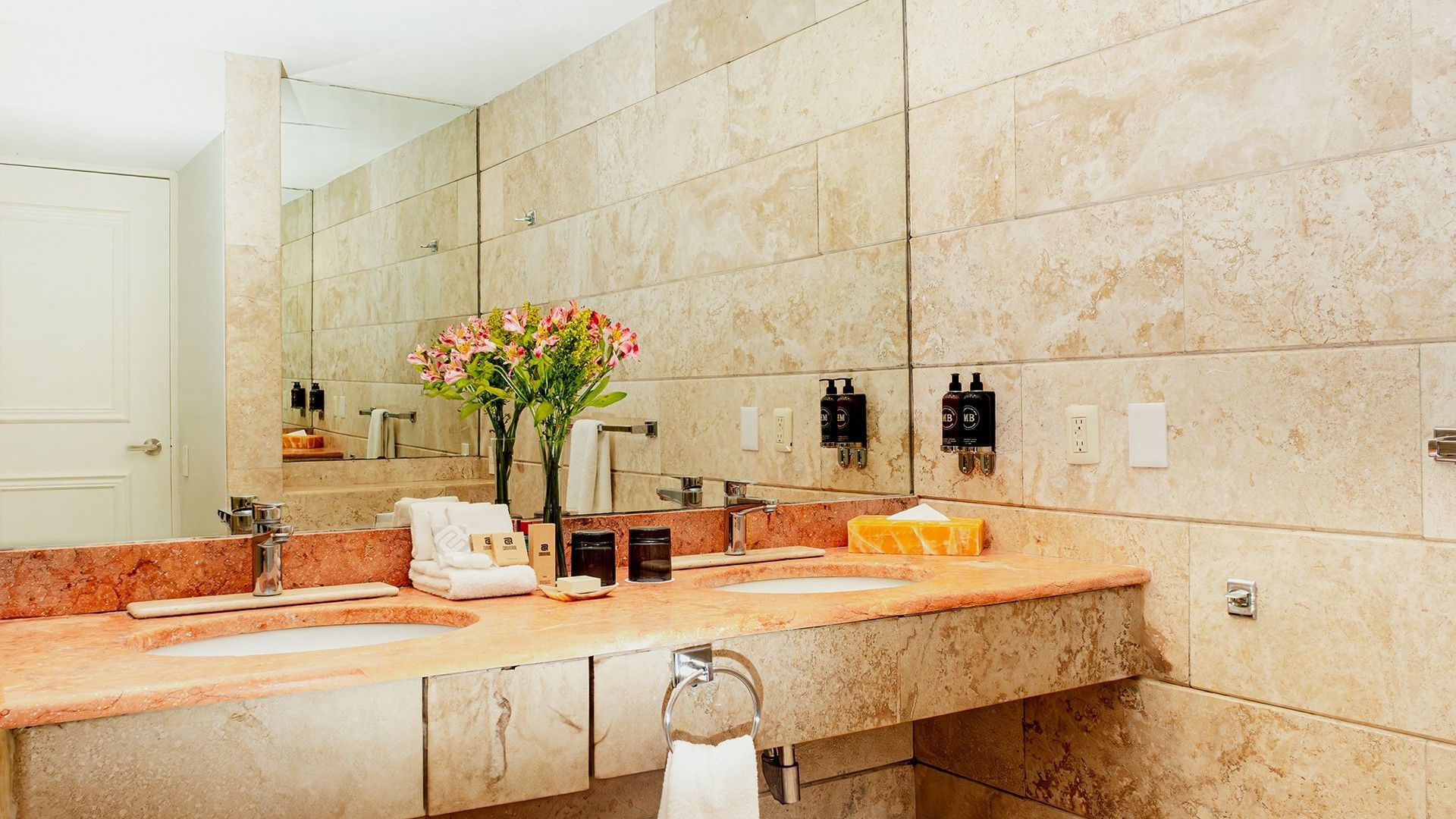 Bathroom vanity with a large mirror and amenities in Two Double Camino Real Club at Camino Real Zaashila Huatulco