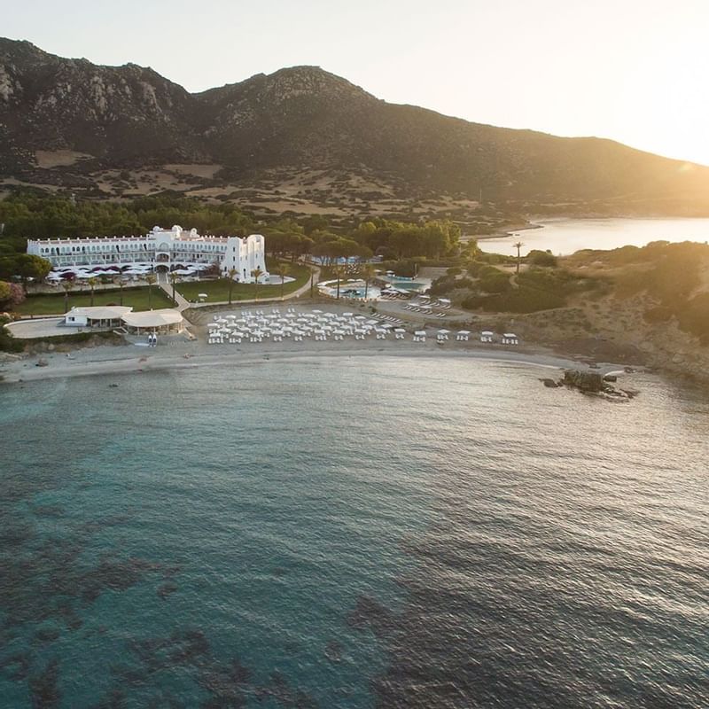 Distant aerial view of Hotel Capo Boi at Falkensteiner Hotels