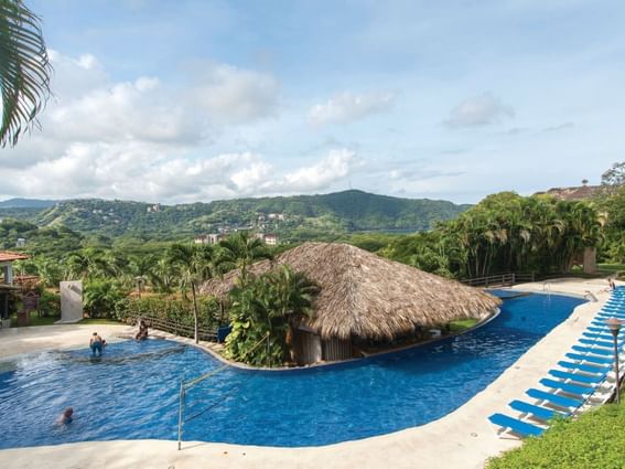 Aerial view of hotel & outdoor pool at Villas Sol Beach Resort