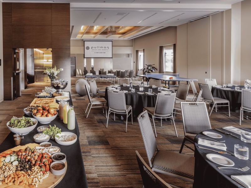 Dining tables & breakfast corner arranged in Nexus Room at Sydney Olympic Park