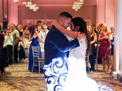 bride and groom dancing