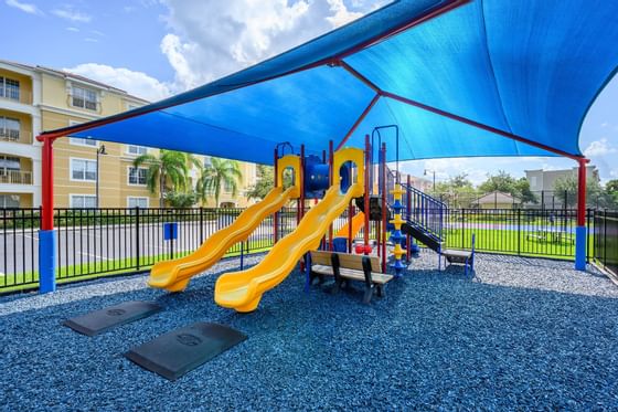 a covered play area with two slides