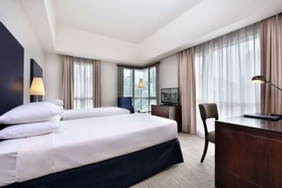 The Capital Deluxe bedroom at Hotel Capitol Kuala Lumpur