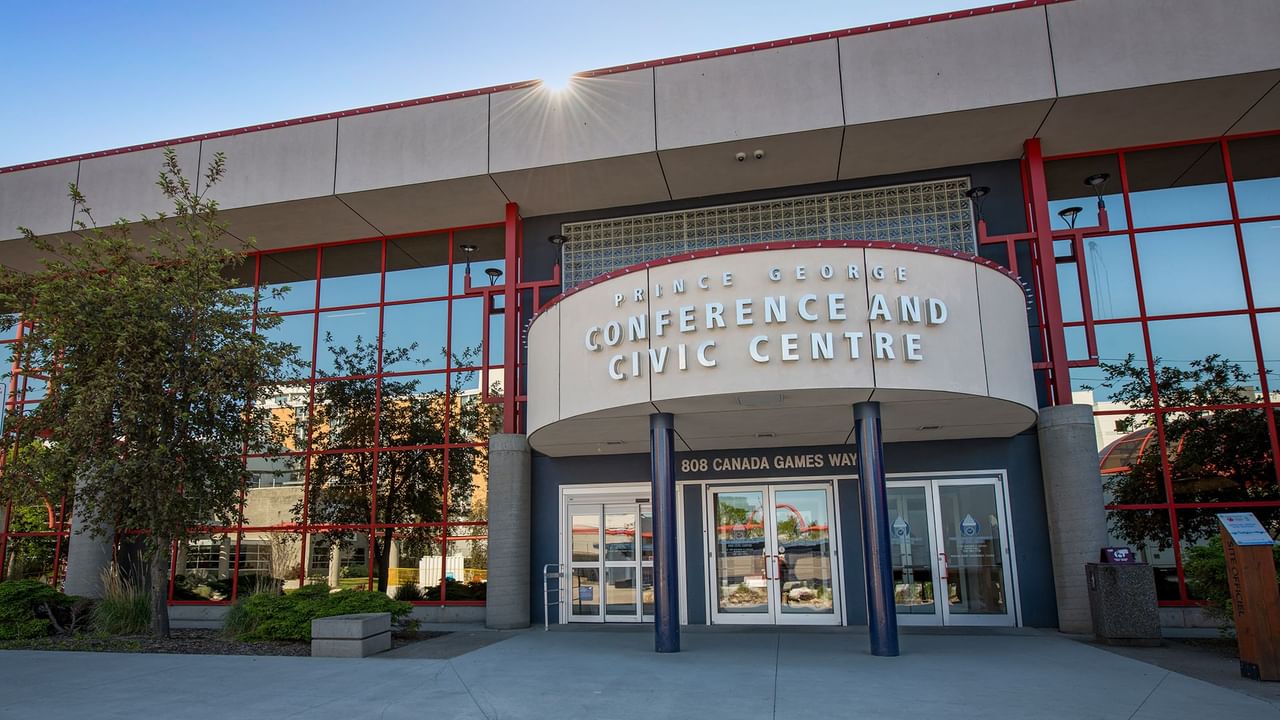 Front entrance of Prince George Conference and Civic Centre with glass doors and windows.