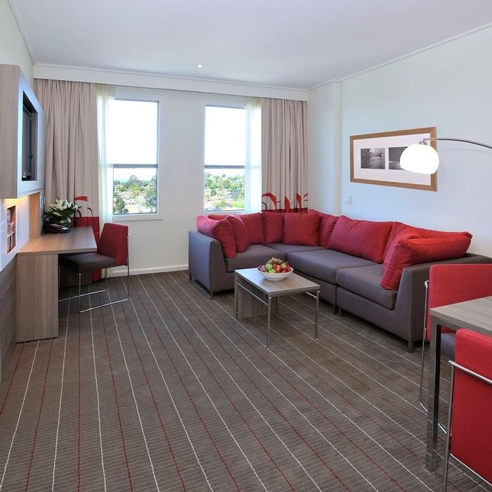 Livingroom area in Superior King Suite at Novotel Glen Waverley