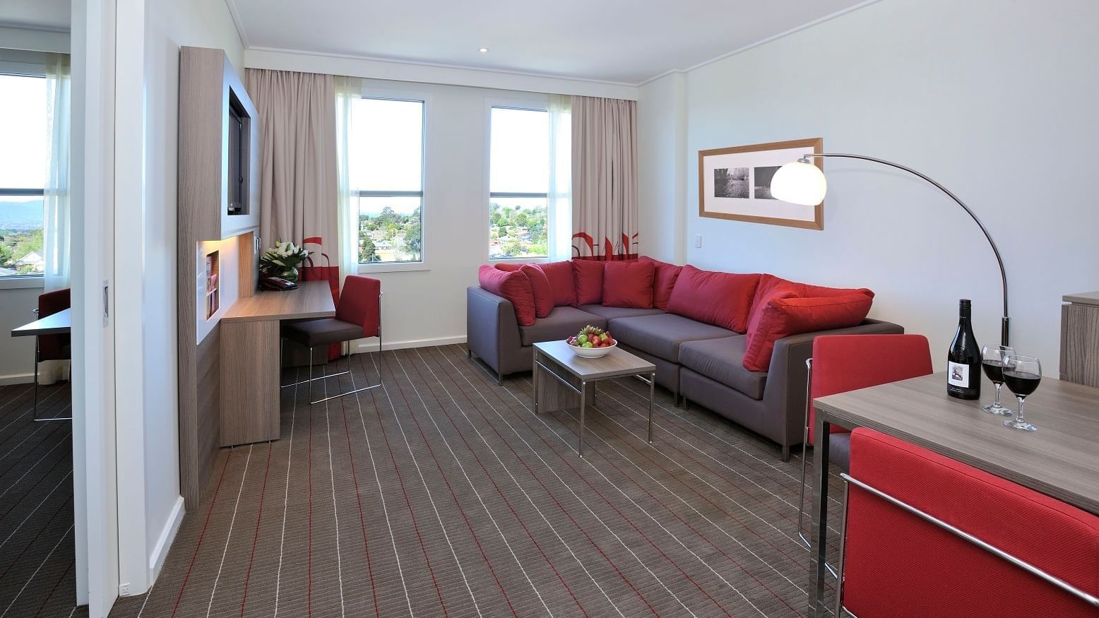 Livingroom area in Superior King Suite at Novotel Glen Waverley