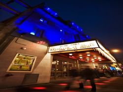 Low-angle view of the entrance at Club Soda near Hotel Zero1