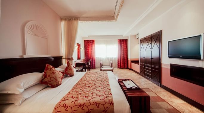 Queen bed in Executive suite at Lake Victoria Serena Resort