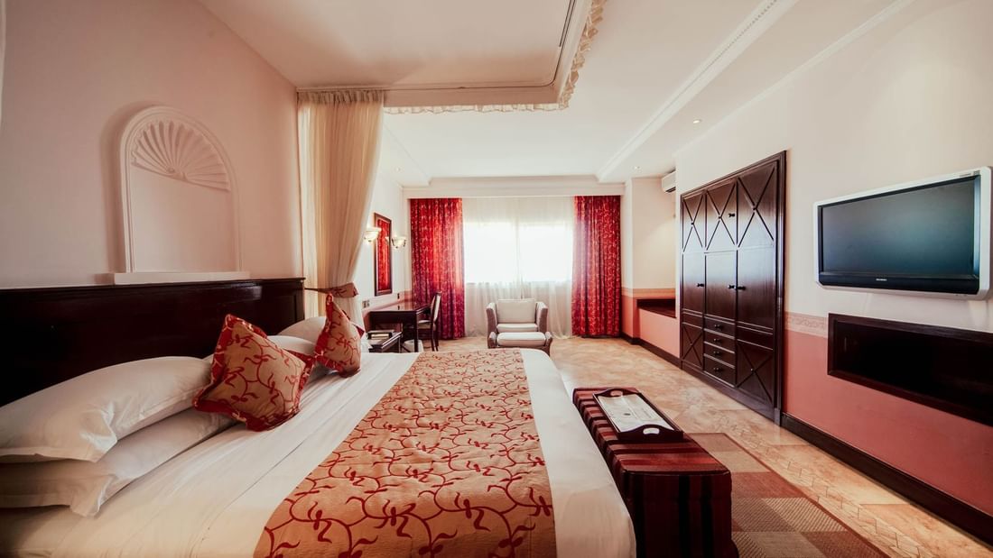 Queen bed in Executive suite at Lake Victoria Serena Resort 