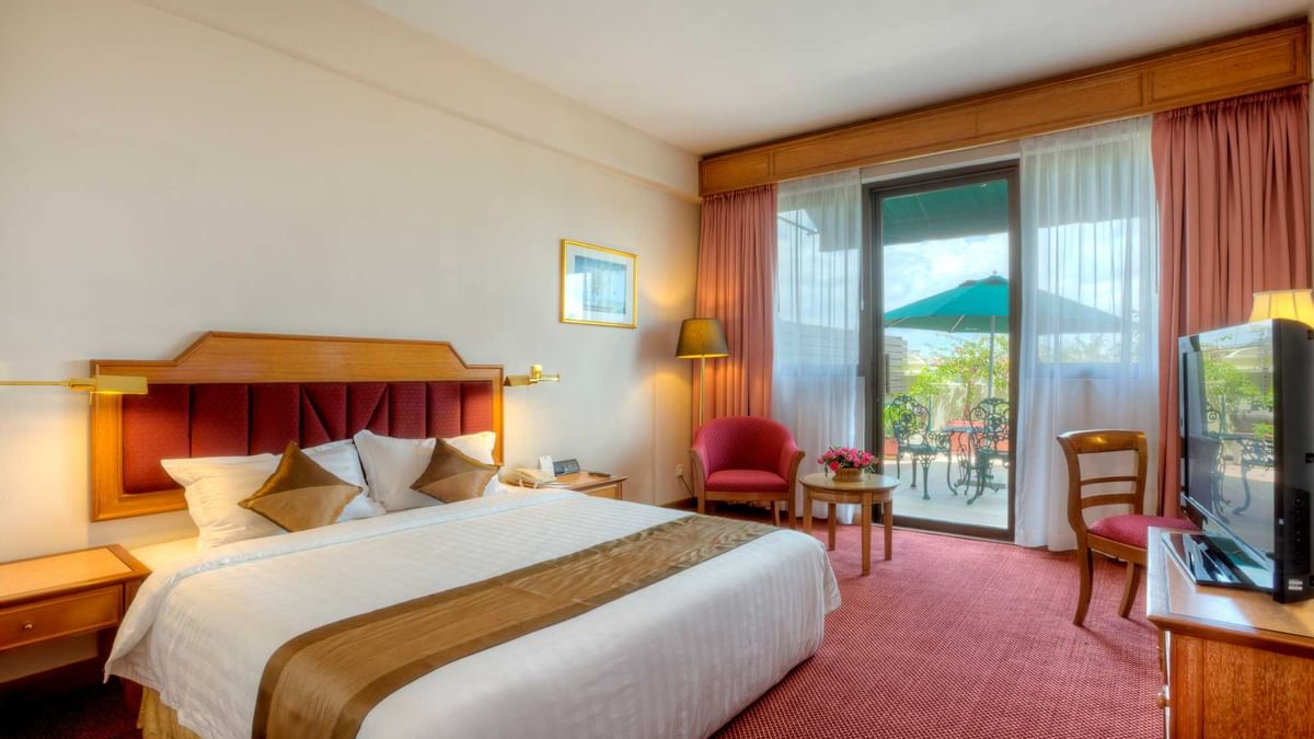 Wall-mounted water dispenser with a bottle in Deluxe Twin at Sunway Hotel Big Box