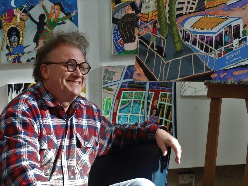 British-Australian artist Bernard Ollis posing at Sofitel Brisbane Central