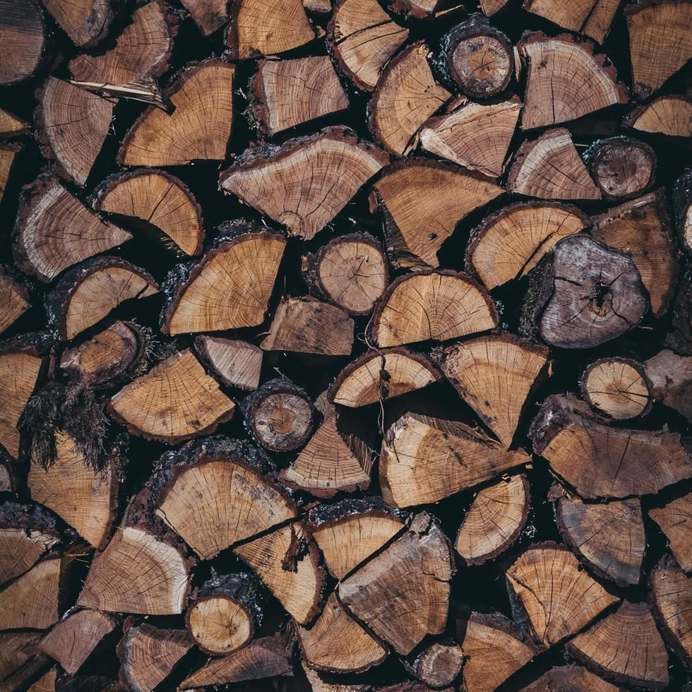 Close-up of firewood stacks at Falkensteiner Hotels