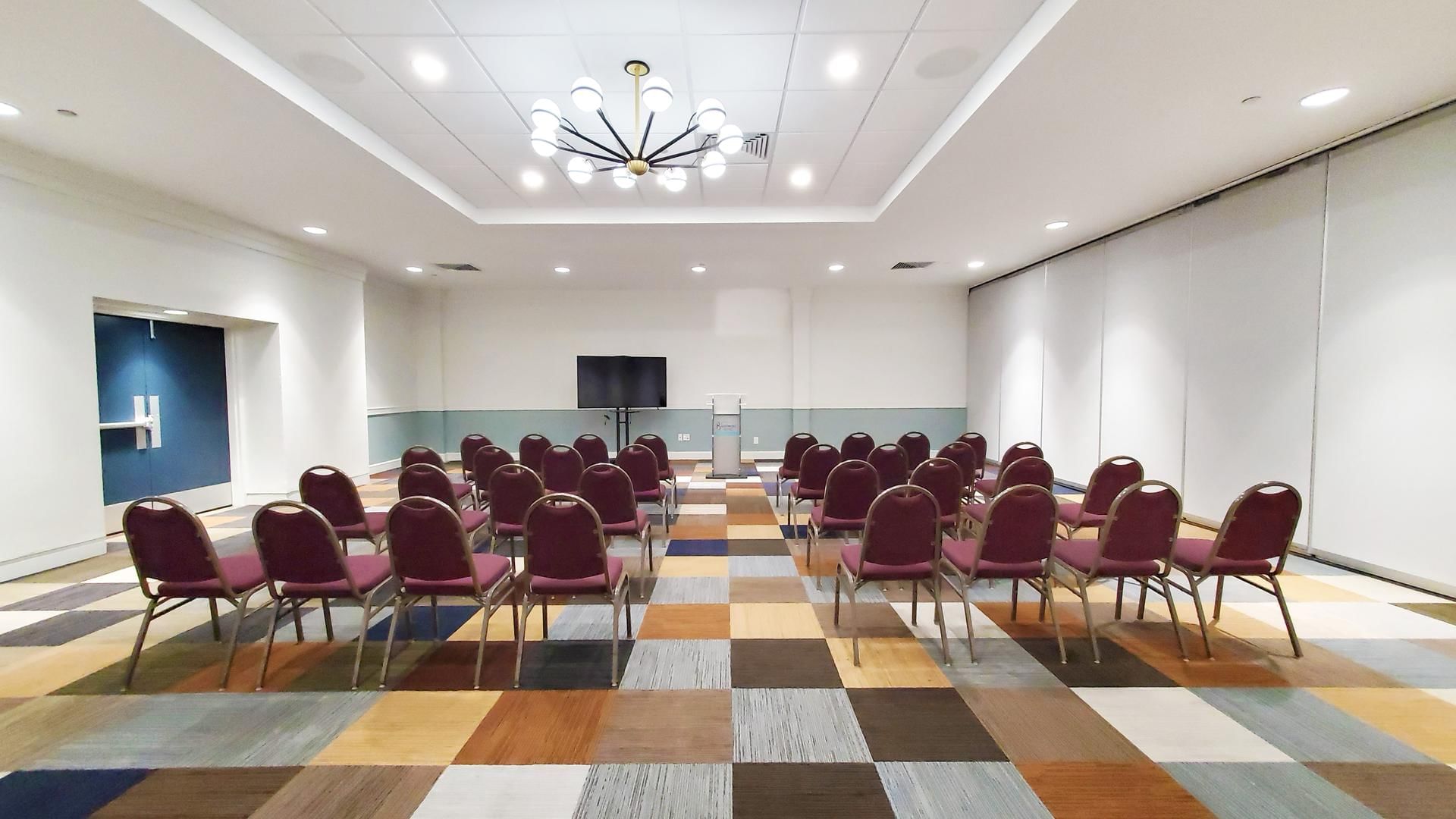Theater-style chair arrangement in a meeting room at The Barrymore Hotel