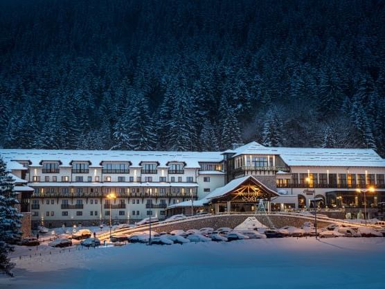 Exterior view of the hotel in winter with snow at Ana Hotels