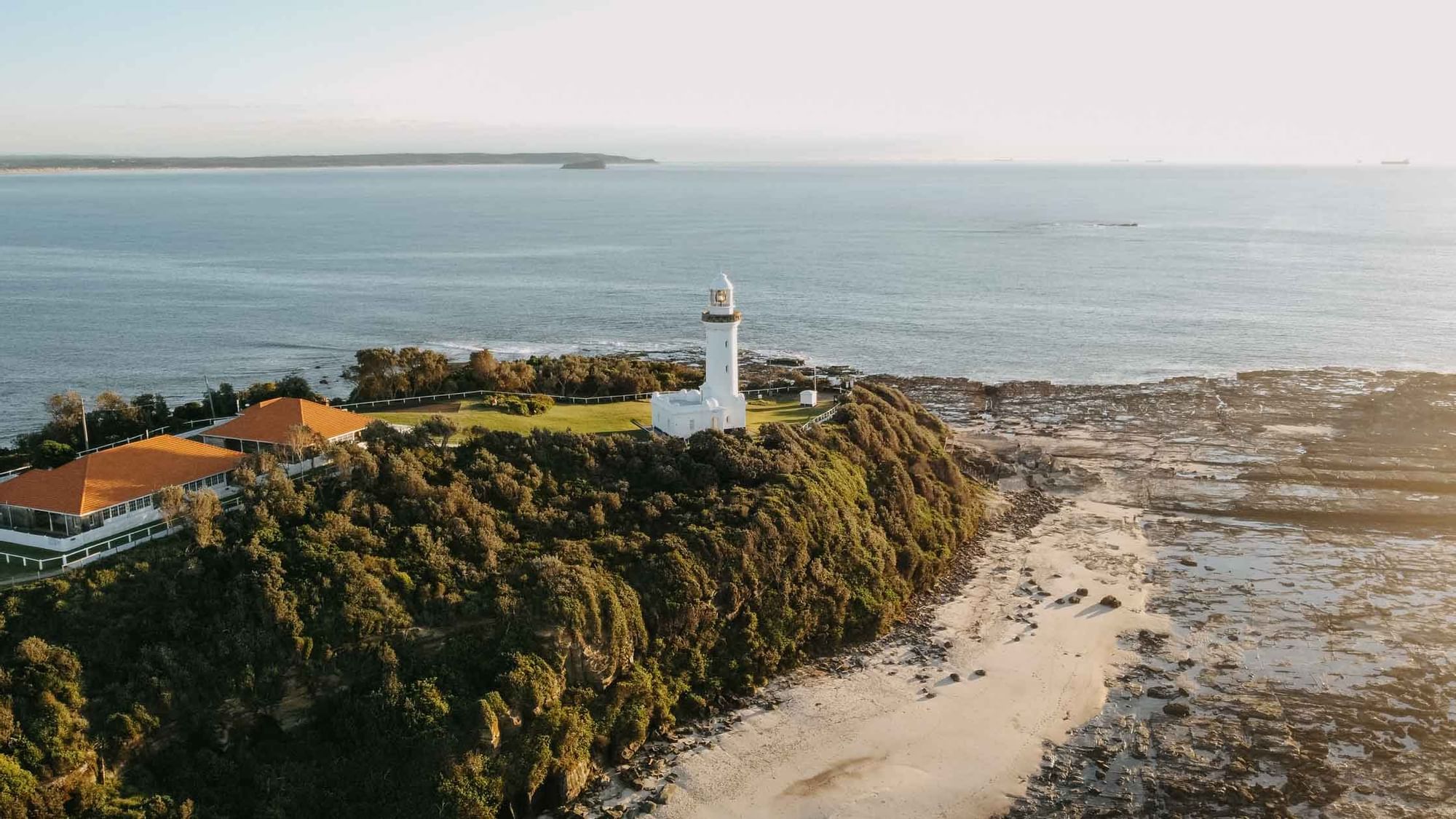 Aerial view of Norah Head Lighthouse near Pullman Magenta Shores