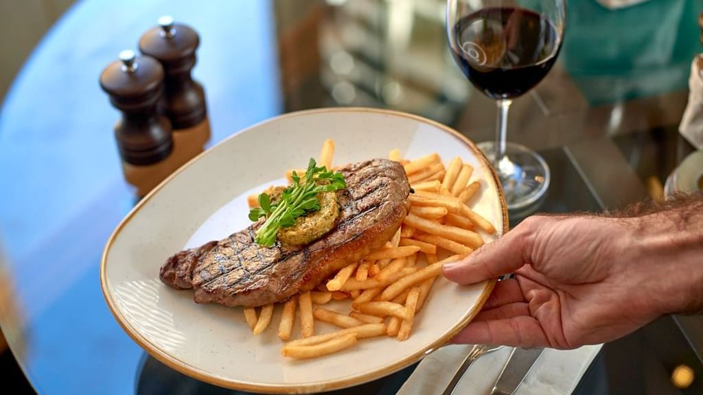 Steak with fries served at The Sebel Quay West Suites Sydney