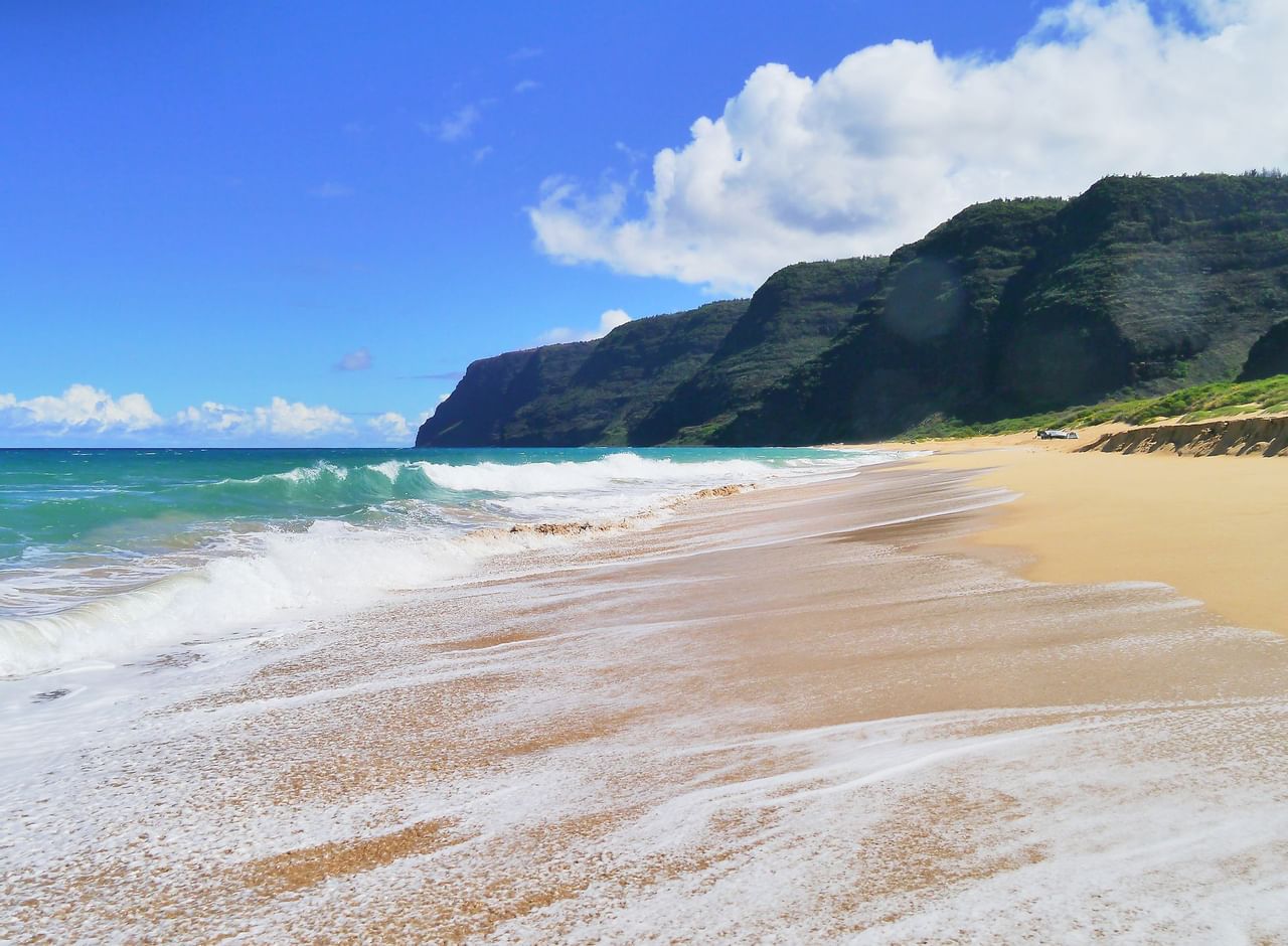 Beach with mountains in background