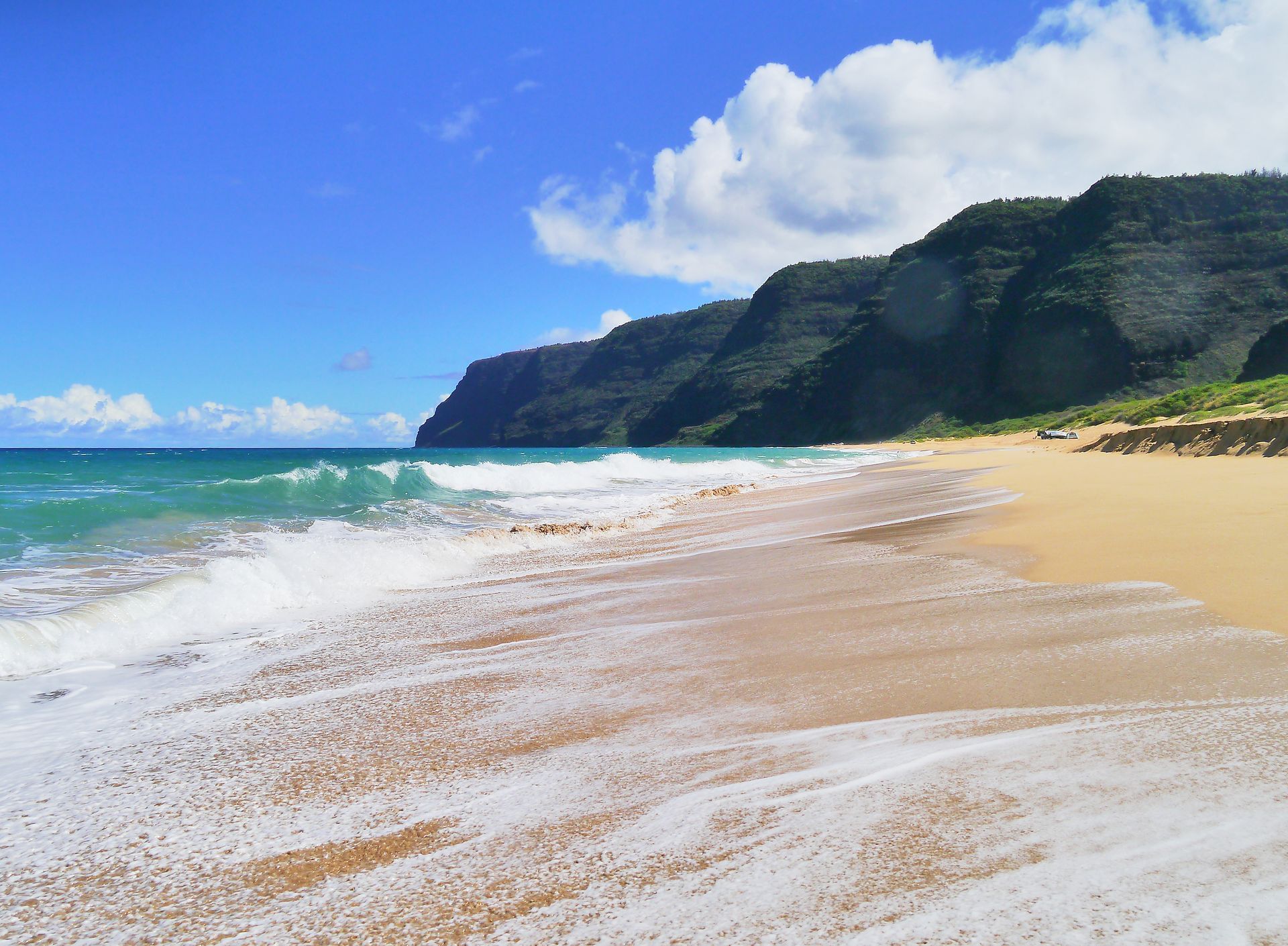 Beach with mountains in background