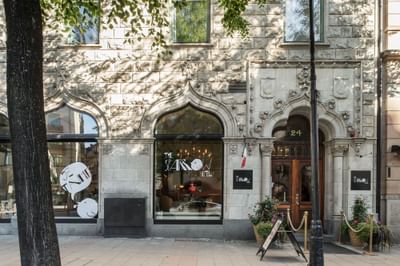 Exterior view of the detailed hotel entrance at The Sparrow Hotel