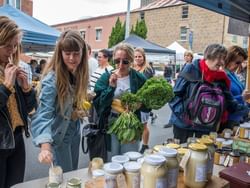 Visitors shopping at the Farm Gate Market near Hotel Grand Chancellor Hobart