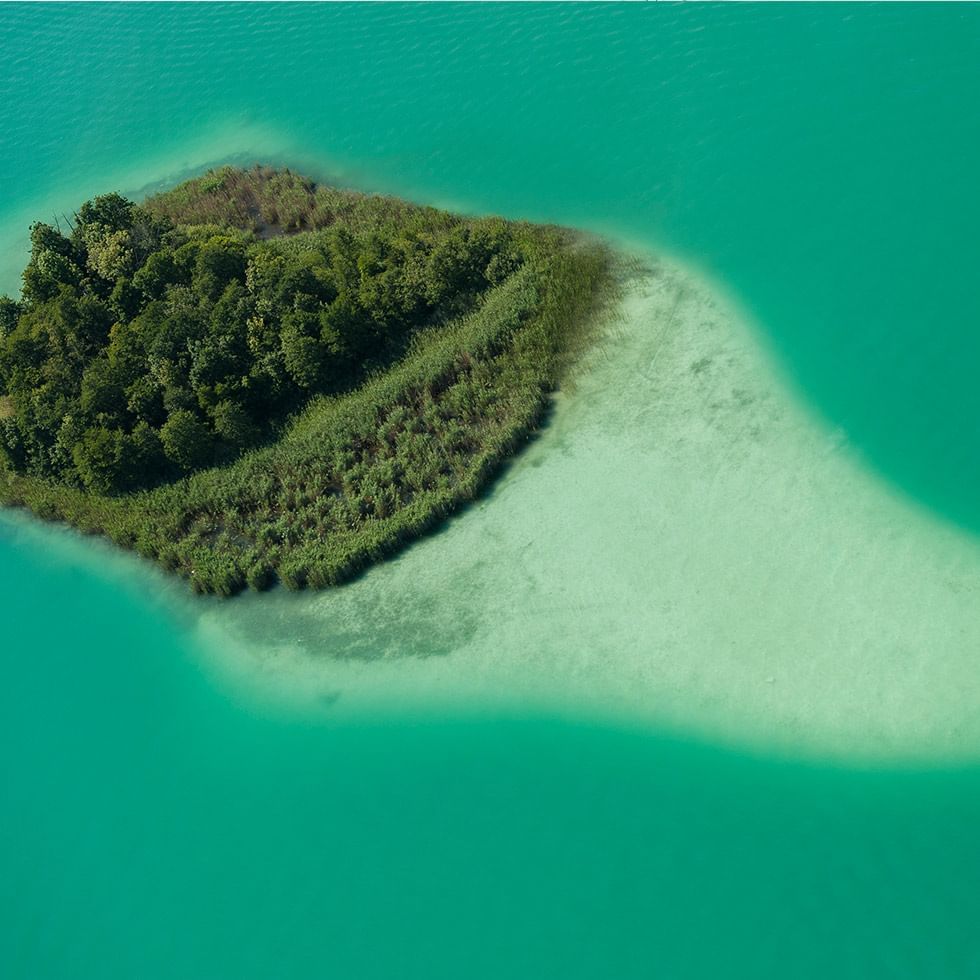 Aerial view of a small island near Falkensteiner Hotels