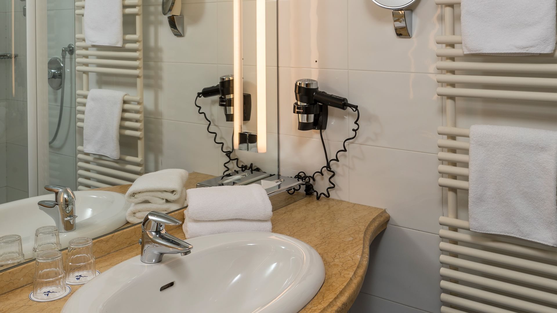 Bathroom vanity, Family Comfort Room at Falkensteiner Hotels