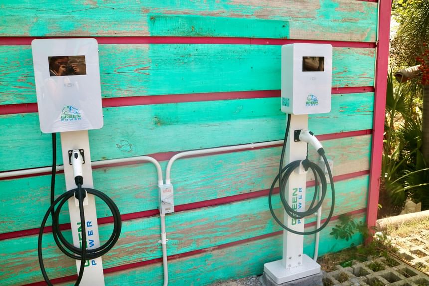 Electric car charger cables near True Blue Bay Hotel