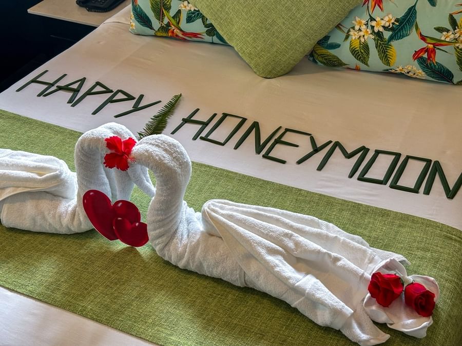 White towel swans by leaf lettering on a lime runner in Studio Villa at TokaToka Resort Nadi Fiji