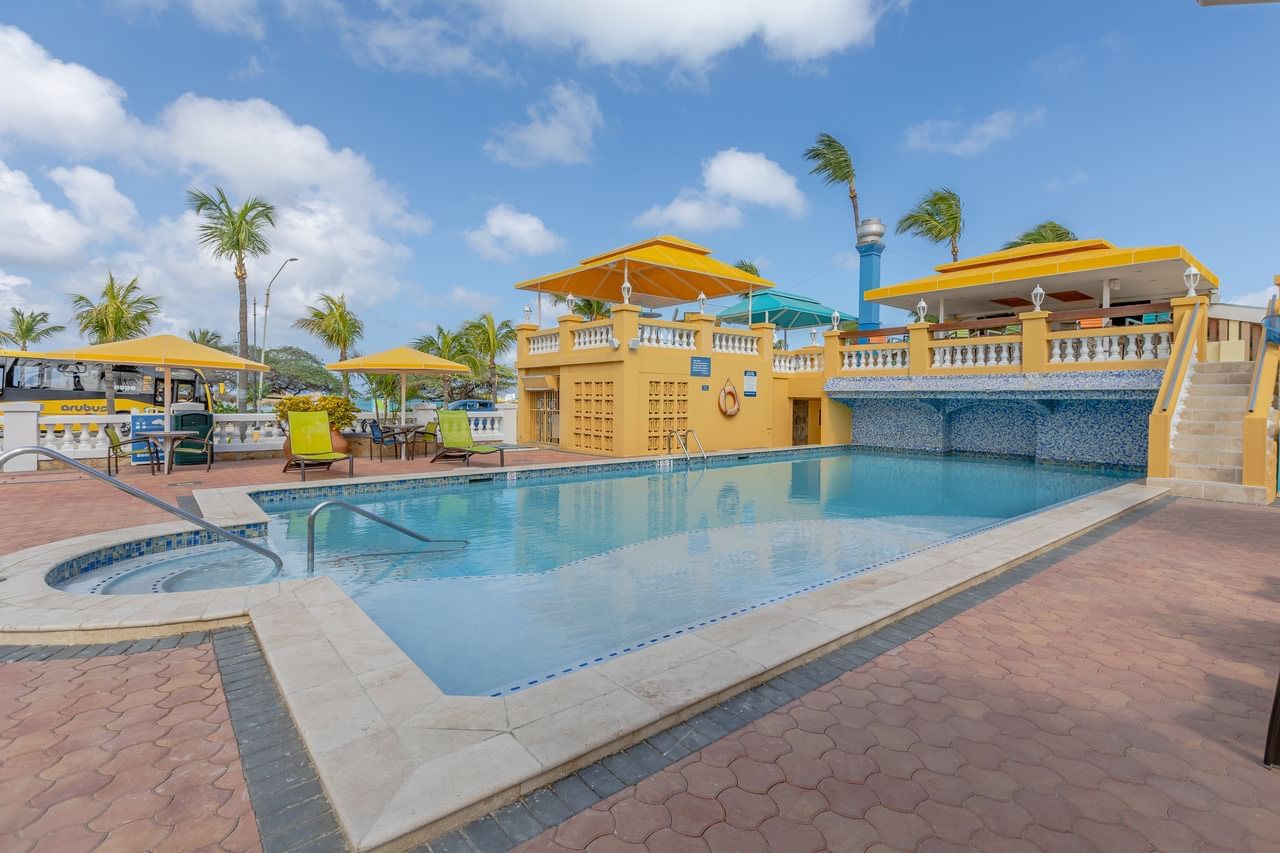 Outdoor pool area at Amsterdam Manor Beach Resort Aruba